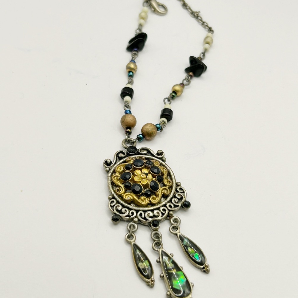 Ornate dream catcher style necklace. It’s just beautiful and gothic style
